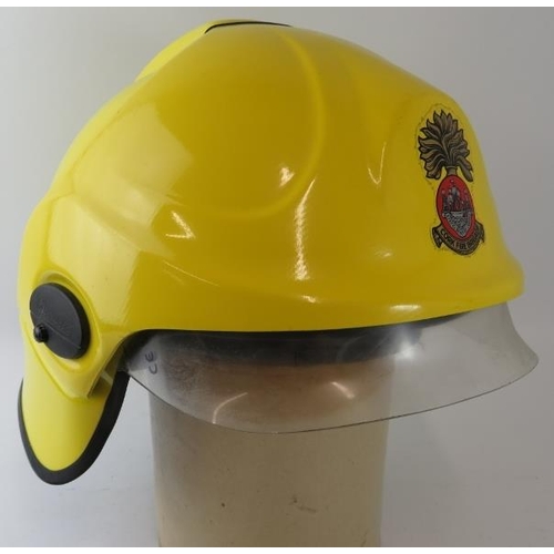 28 - A 1990s Irish Cork Fire Brigade integrated visor fire helmet