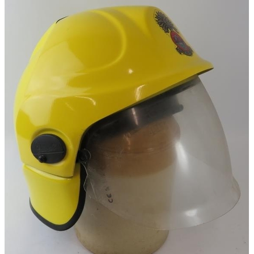 28 - A 1990s Irish Cork Fire Brigade integrated visor fire helmet