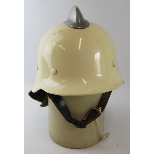 3 - A 1980s Dutch Fire Service white steel fire helmet with polished metal comb and leather neck cowl.