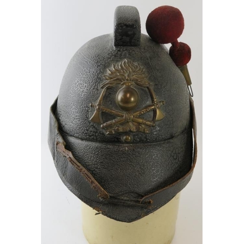 33 - A rare early 20th century Argentine felt fire helmet with red felt side plume, circa 1910