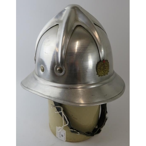 40 - A 1970s Yugoslavia Fire Service polished aluminium fire helmet.