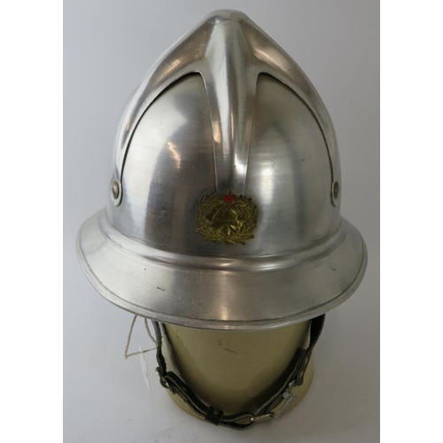 40 - A 1970s Yugoslavia Fire Service polished aluminium fire helmet.