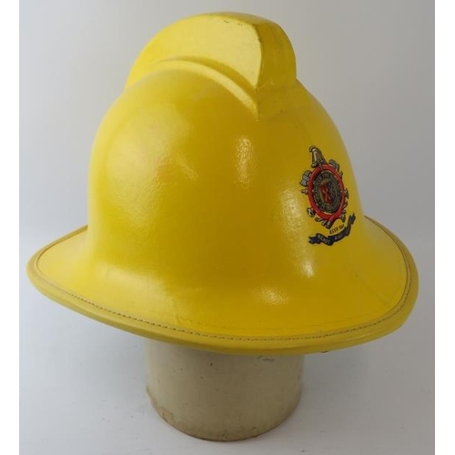 43 - A 1980s British Peterborough Fire Brigade yellow fire helmet