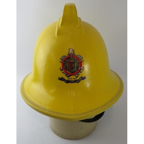 43 - A 1980s British Peterborough Fire Brigade yellow fire helmet