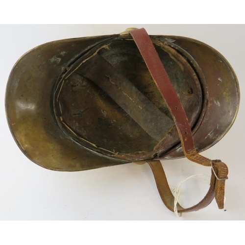 53 - An early 20th century brass Russian Fire Service fire helmet with partial liner.