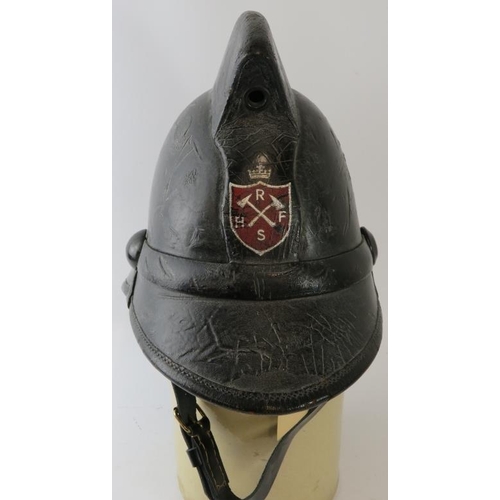 54 - A 1960s British Hendry Metro fire helmet, badged RHFS