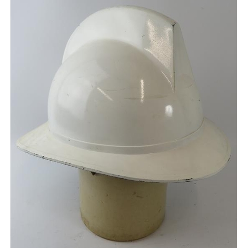 55 - A 1970s white Belgian Fire Service fibreglass fire helmet