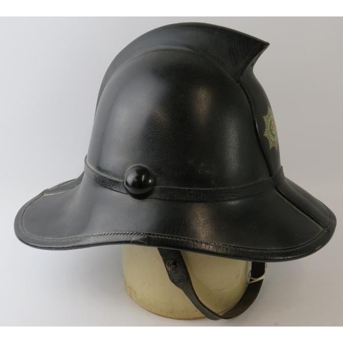 6 - A 1960s British Fire Services Association black leather Hendry Metro fire helmet