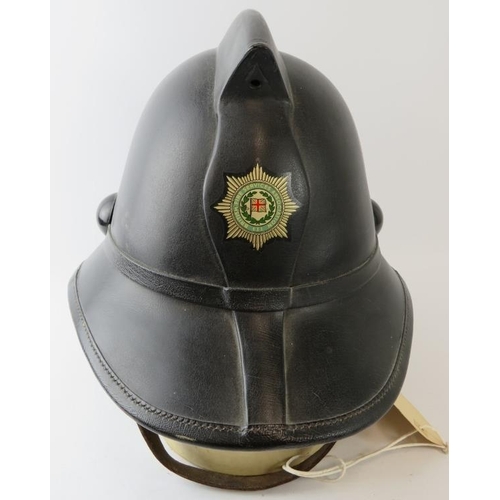 6 - A 1960s British Fire Services Association black leather Hendry Metro fire helmet