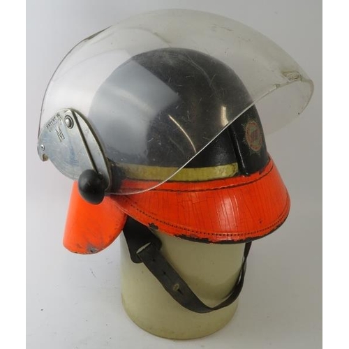 62 - A 1964 British Airports Authority Fire Service Hendry fire helmet with visor