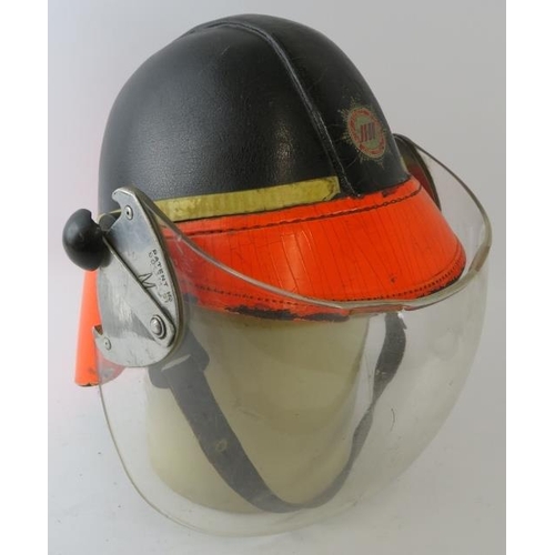 62 - A 1964 British Airports Authority Fire Service Hendry fire helmet with visor