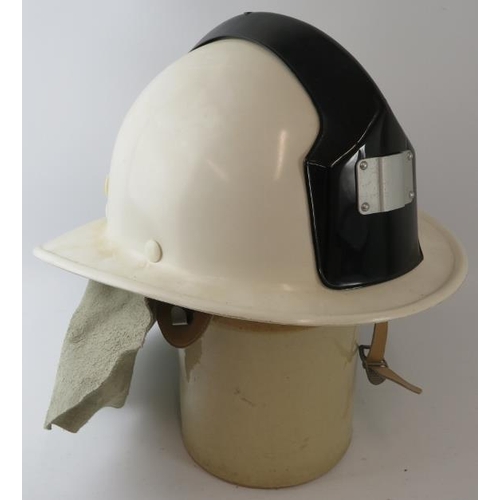 65 - A 1990s Czechoslovakia Fire Service white Ergon fibreglass fire helmet with leather neck cowl