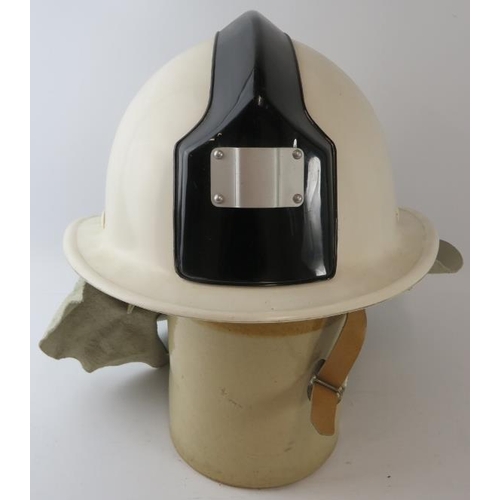 65 - A 1990s Czechoslovakia Fire Service white Ergon fibreglass fire helmet with leather neck cowl