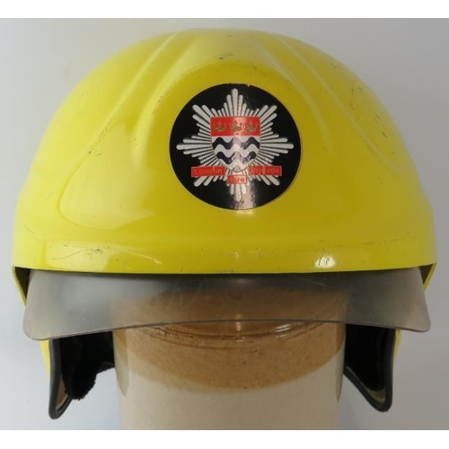 66 - A 2010 British London Fire Brigade Cromwell integrated system fire helmet