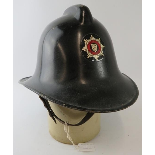 7 - A British 1960s Derbyshire Fire Service fire helmet.