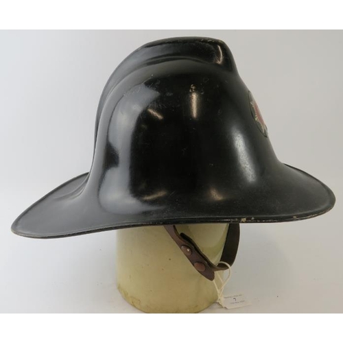 7 - A British 1960s Derbyshire Fire Service fire helmet.