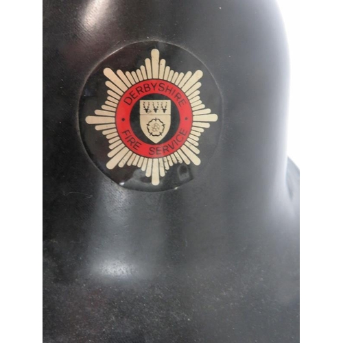 7 - A British 1960s Derbyshire Fire Service fire helmet.