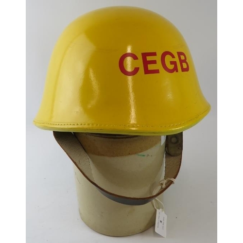 8 - A British CEGB power station fire service yellow leather covered fire helmet