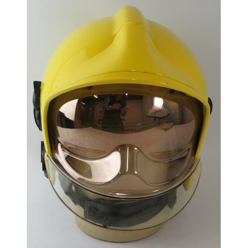 83 - A modern MSA Gallet ABS fire helmet with reflective integrated visor system
