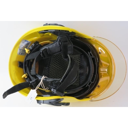 83 - A modern MSA Gallet ABS fire helmet with reflective integrated visor system