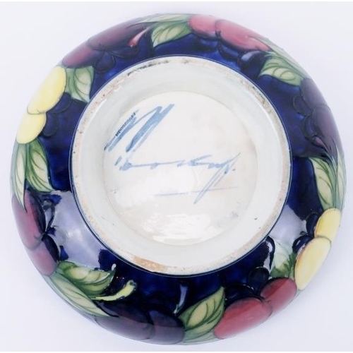 10 - A William Moorcroft ‘Wisteria’ pattern bowl, circa 1920s. Signed ‘W Moorcroft’ in blue with impresse... 