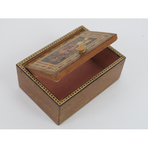 100 - Three Tunbridge ware parquetry inlaid items. Comprising a hair brush, trinket box and cylindrical (3... 