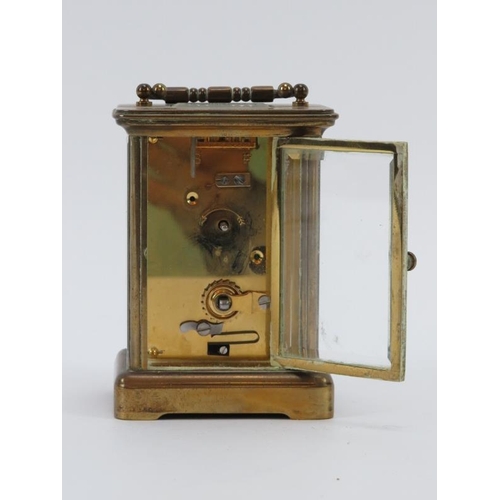 104 - A brass carriage clock by Matthew Norman of London. 12 cm height. Condition report: Some age related... 