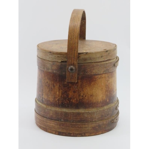 109 - A bentwood coopered pail with swing handle and cover, 19th century. cm height. Condition report: Som... 