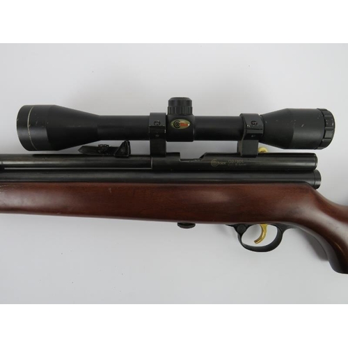 123 - An SMK QB78DL 5.5mm .22 calibre air rifle. Fitted with CO2 reservoir below the barrel and SMK 4X40 t... 