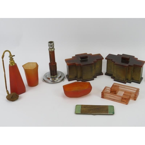 124 - A group of Art Deco bakelite and glass items, circa 1920s/30s. Including boxes, a pair of candlestic... 