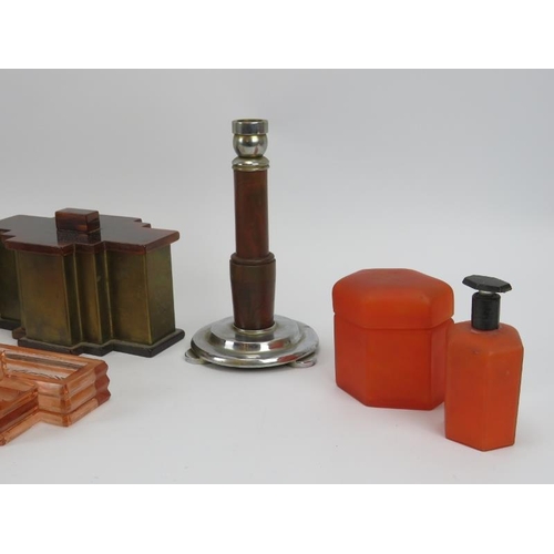 124 - A group of Art Deco bakelite and glass items, circa 1920s/30s. Including boxes, a pair of candlestic... 