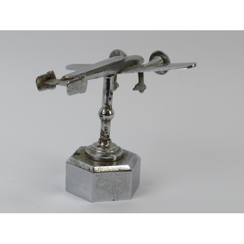 135 - A WWII chromed metal desktop sweetheart model of an RAF bomber. Inscribed ‘Made by T H Overl R.A.O.C... 