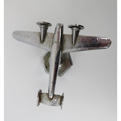 135 - A WWII chromed metal desktop sweetheart model of an RAF bomber. Inscribed ‘Made by T H Overl R.A.O.C... 