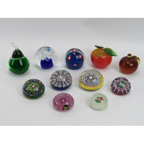 139 - A collection of British and European paperweight. Makers include Italian Murano, Scottish Moncrieff ... 