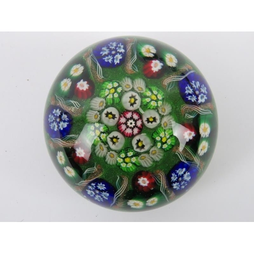 139 - A collection of British and European paperweight. Makers include Italian Murano, Scottish Moncrieff ... 