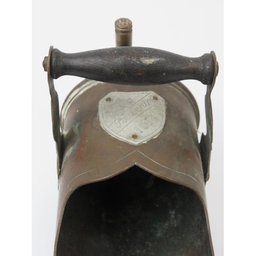 146 - Militaria: A group of WWI trench art and spent shells. Miniature coal scuttle: 21 cm length. Conditi... 