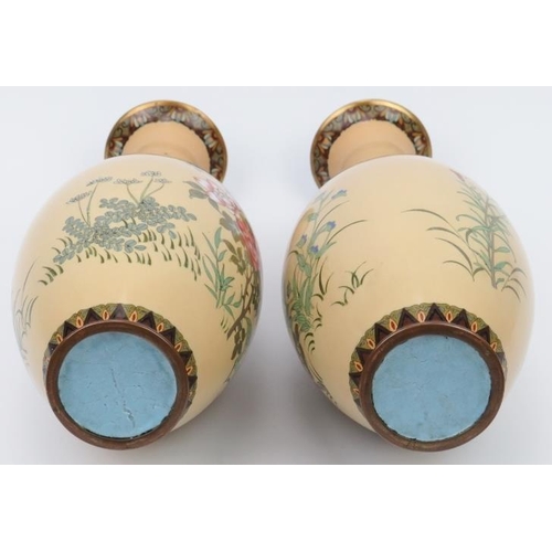 15 - A pair of Japanese cloisonné enamelled vases, late Meiji period. Decorated with birds amongst flower... 