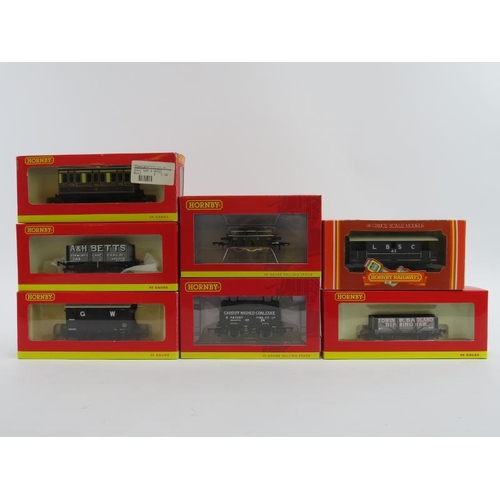 198 - Toys and Models: Six Hornby 00 gauge wagons and a coach. (R6590 / R6588 / R446 / R6402 / R019 / R664... 