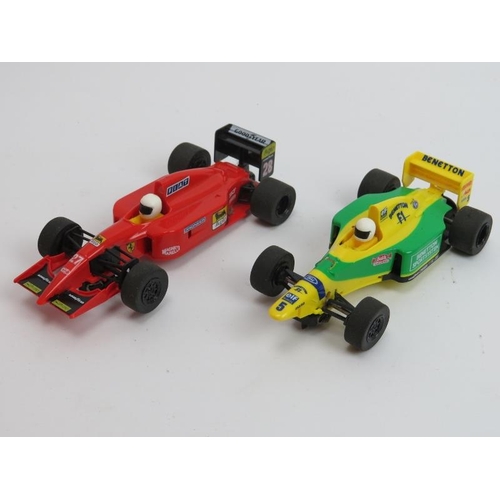 210 - Toys and Models: A Scalextric Monaco racing set. With two F1 racing cars included.  Condition report... 