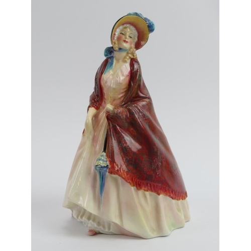 222 - Four Royal Doulton figurines. Comprising Paisley Shawl (HN 1987), Autumn Breezes (HN 1934), Lydia (H... 