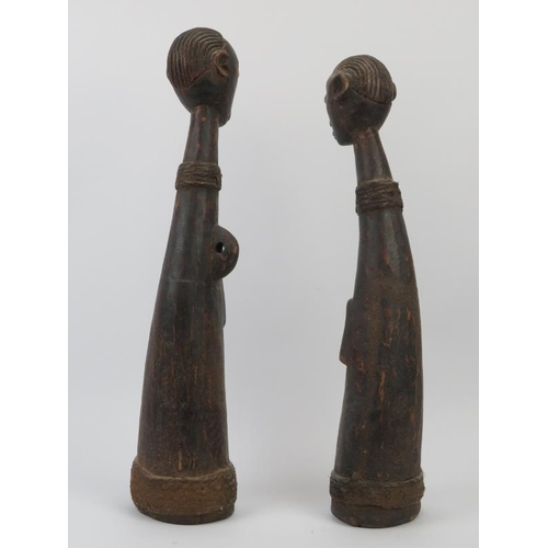 227 - Tribal Art: A large pair of West African carved wood figures, Congo. (2 items) 59 cm height, 56 cm h... 