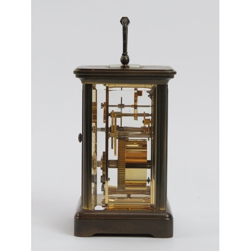 233 - An English eleven jewels brass carriage clock by Matthew Norman of London, 20th century. Key include... 