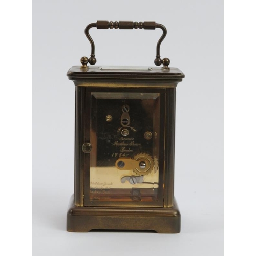 233 - An English eleven jewels brass carriage clock by Matthew Norman of London, 20th century. Key include... 