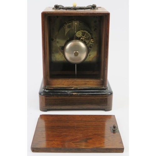 36 - A French marquetry inlaid rosewood mantle clock by Henry Marc of Paris, 19th century. With a vertica... 