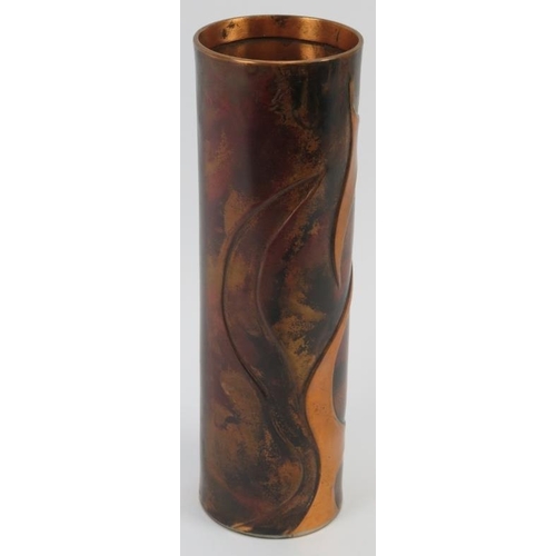 39 - A cylindrical copper vase by Sam Fanaroff. Initialled SF beneath. 26.8 cm height. 

CR: Some age rel... 