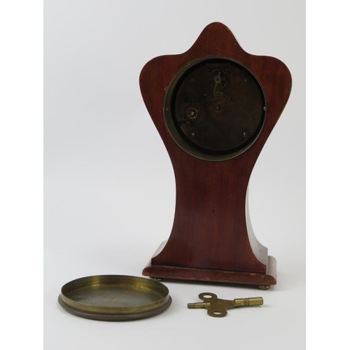 58 - An Edwardian marquetry inlaid mahogany mantel clock. 34.4 cm height. Condition report: Some age rela... 