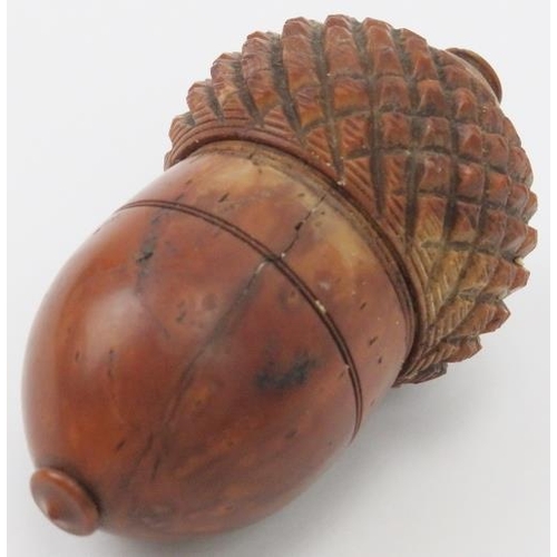 6 - A turned and carved wood coquille nut nutmeg grater of acorn form, late 18th/19th century. 8.4 cm le... 