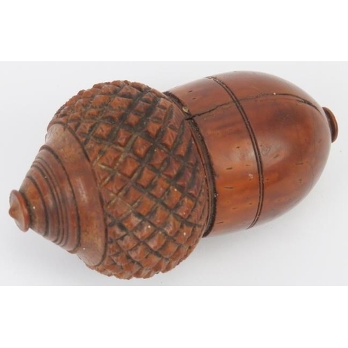 6 - A turned and carved wood coquille nut nutmeg grater of acorn form, late 18th/19th century. 8.4 cm le... 