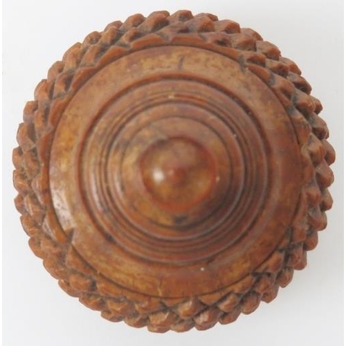 6 - A turned and carved wood coquille nut nutmeg grater of acorn form, late 18th/19th century. 8.4 cm le... 