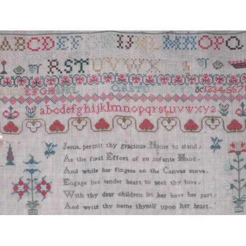 60 - A George IV period embroidered needlework sampler, dated 1927. Framed and glazed. 43 cm x 31 cm. Con... 